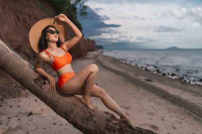 Young woman in bikini on beach