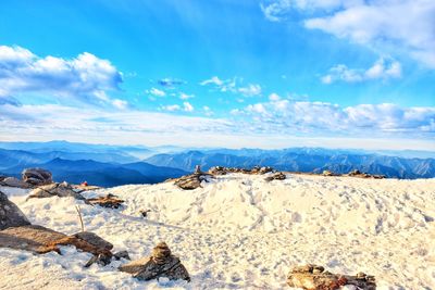 Scenic view of snowcapped mountains against sky