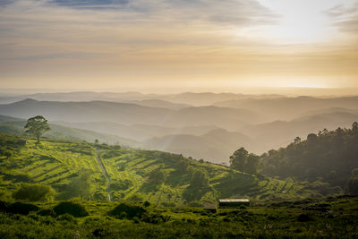 Scenic view of mountains against sky during sunset