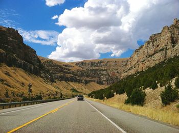 Road leading towards mountains