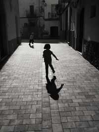 Children playing on paved street