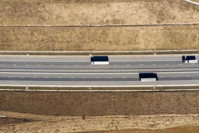 Aerial drone view of trucks passing on a highway. a0 highway, turda-gilau section, romania