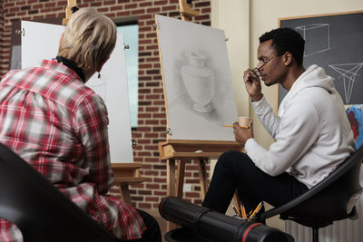 Students sitting in drawing workshop