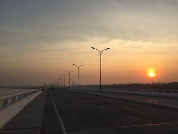 Road against sky during sunset