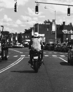 Woman standing on city street