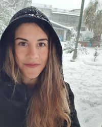 Portrait of young woman in winter