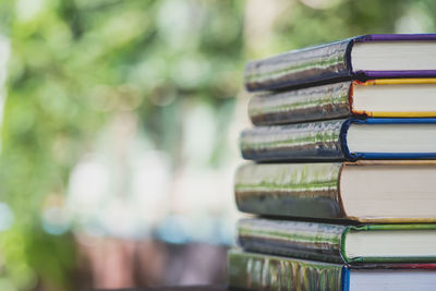 Close-up of books stacked on table