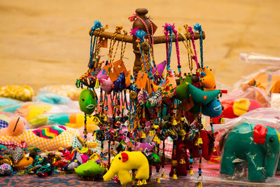 Close-up of toys for sale at market 