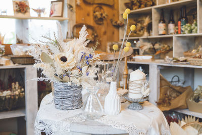 Close-up of dried flower on table