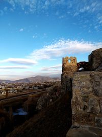 View of fort against blue sky