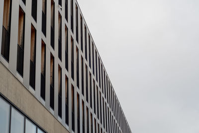 Low angle view of modern building against clear sky