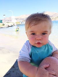 Portrait of cute boy at beach