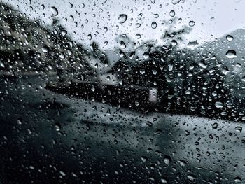 Full frame shot of raindrops on glass window