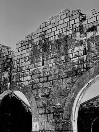 Low angle view of old building against sky