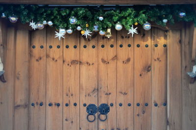 Christmas decorations hanging over front door