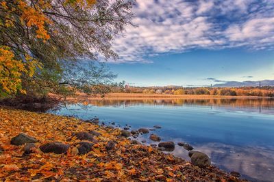 Scenic view of lake against sky during autumn