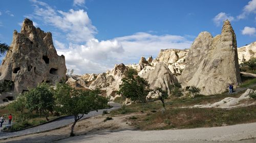 Panoramic view of rocks and mountains against sky