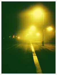 Illuminated street light at night