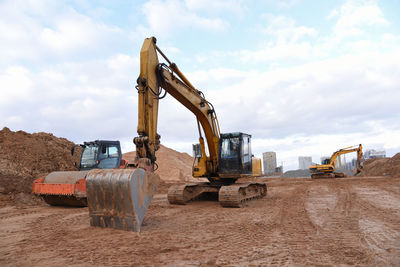 Construction site on field against sky