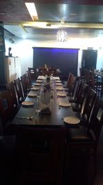 Empty chairs and tables in restaurant