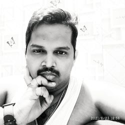 Close-up portrait of young man with text