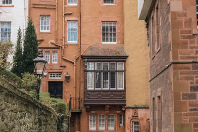 Low angle view of old building near edinburgh castle, ramsay garden, edinburgh, scotland, uk