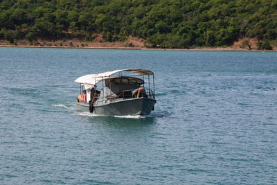 Boat sailing in sea