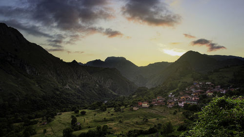 Scenic view of mountains against sky during sunset