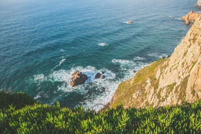 High angle view of sea shore against sky
