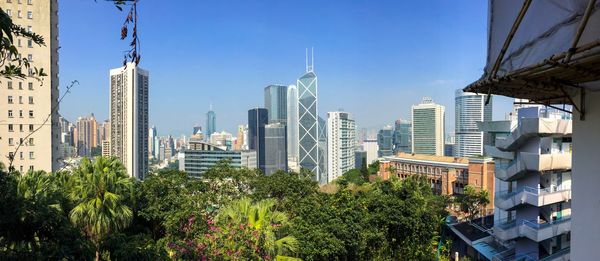 View of skyscrapers against blue sky