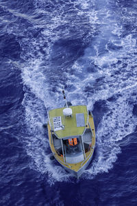 High angle view of sailboat in sea