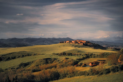 Scenic view of landscape against sky during sunset