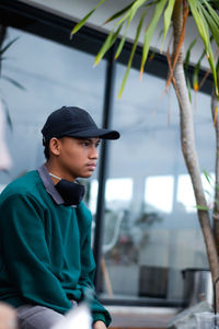 Portrait of a young man looking away