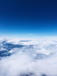 Aerial view of clouds over blue sky