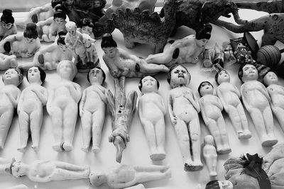 High angle view of statues in market stall for sale