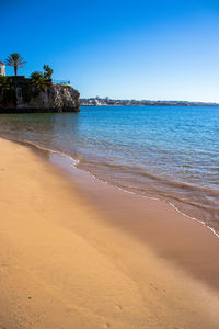 Scenic view of sea against clear sky