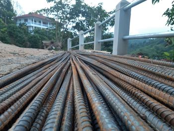 Surface level of railroad tracks against sky