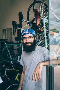 Portrait of young man cycling on bicycle