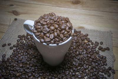 High angle view of coffee beans on table