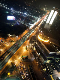 High angle view of illuminated city street at night