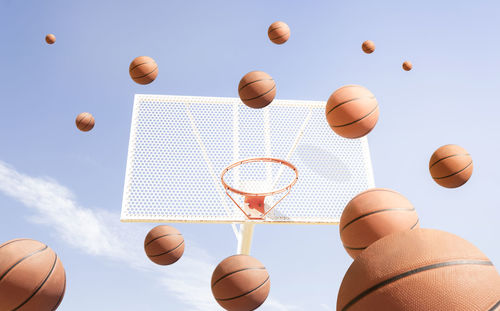 Low angle view of basketball hoop against sky