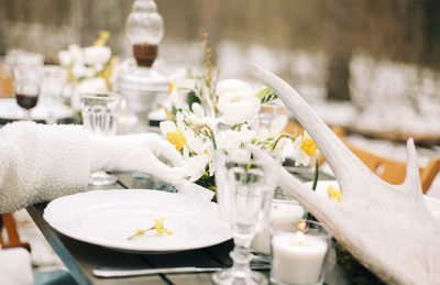 Close-up of white flower vase on table