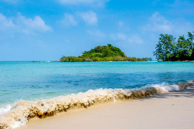 Scenic view of beach against sky