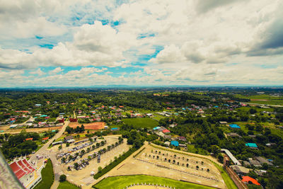 High angle view of buildings in city against sky