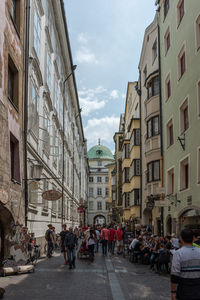 People walking on street in city