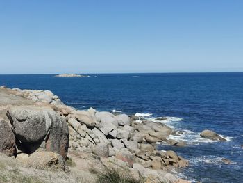 Scenic view of sea against clear sky