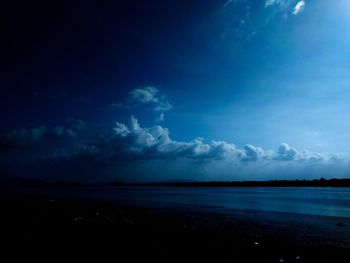 Scenic view of sea against blue sky