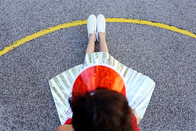 Girl sitting on playground