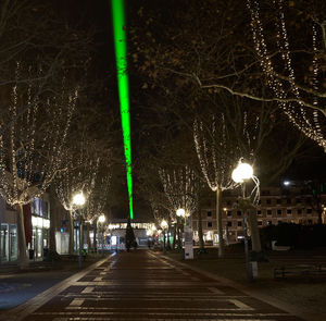 Illuminated street lights at night