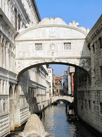 Arch bridge over river